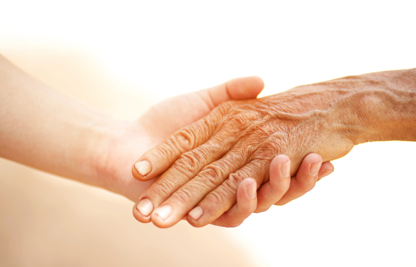 Hände in Pflege und Unterstützung